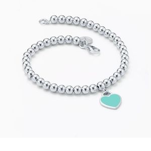 Tiffany & Co. blue heart beaded bracelet